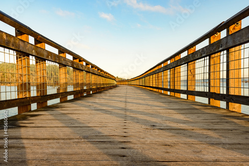 Wooden boardwalk walkway the over water ay the Billy Frank Jr Nisqually National Wildlife Refuge near Olympia Washington