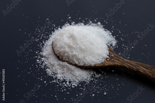 Salt on dark background. copy space