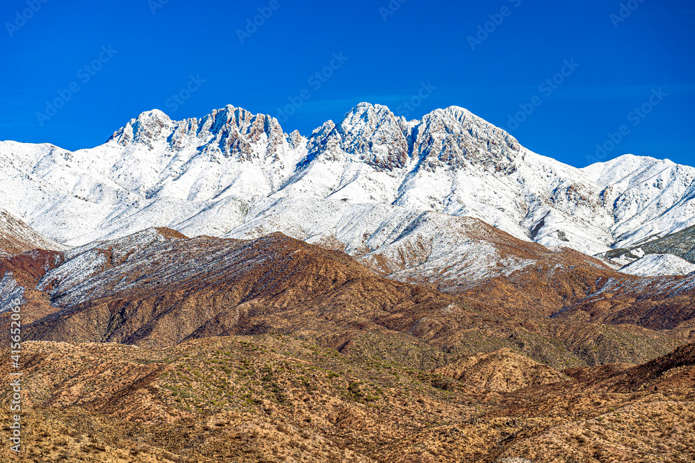 The snow capped mountain peaks in the Arizona desert