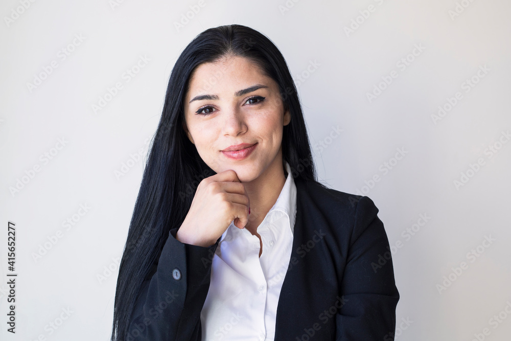 Portrait of businesswoman on grey background Portrait of businesswoman on grey background