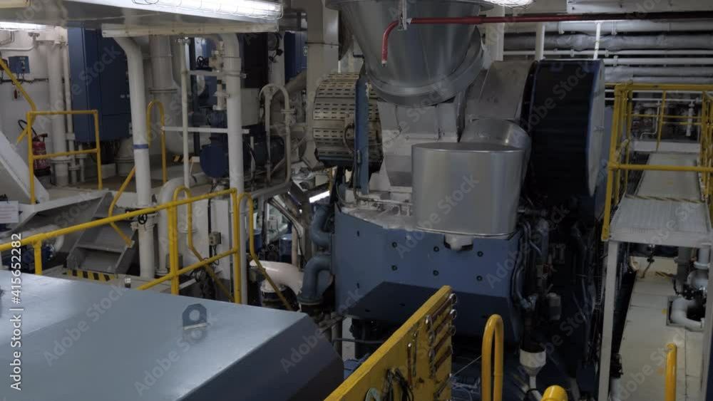 Four stroke main engine with shaft generator in engine room of ship Four stroke main engine with shaft generator in engine room of ship