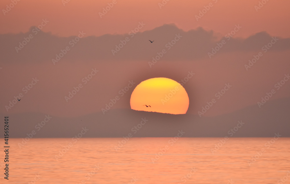Sunset on the sea with clouds Sunset on the sea with clouds