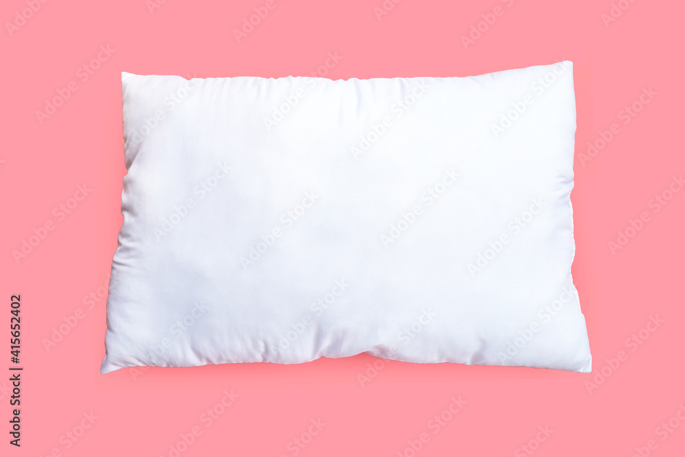 Obraz premium White pillow on pink background.