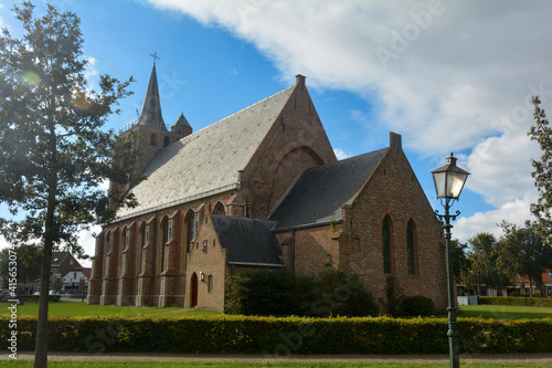 Sint Jacobus Church in Renesse, Zeeland, Netherlands with sun