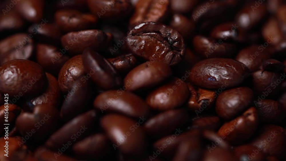 Coffee beans close up filmed with motion Coffee beans close up filmed with motion