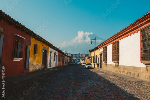 Colorful streets leading to a volcano