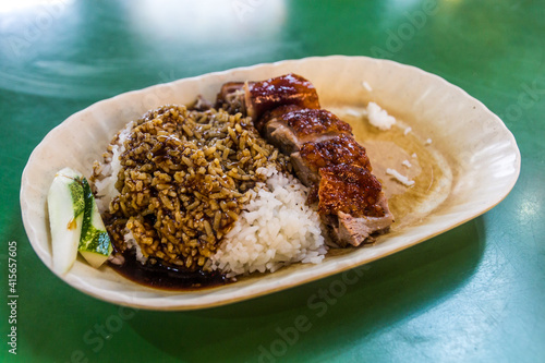 Photography Rice with meat, meal in the Chinatown hawker center in Singapore.