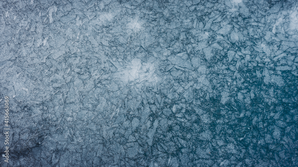 Frozen lake surface from above. Thick ice Frozen lake surface from above. Thick ice