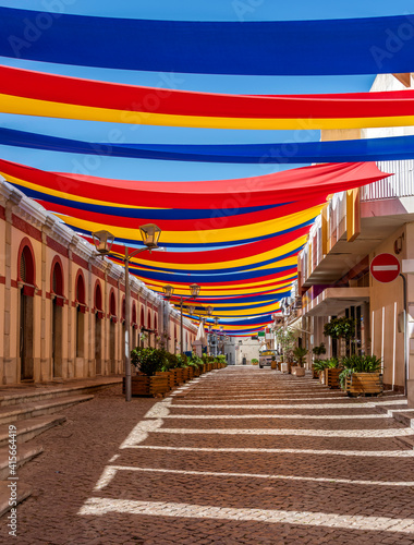 A colourful empty street shot in Loule, Algarve, Portugal photo