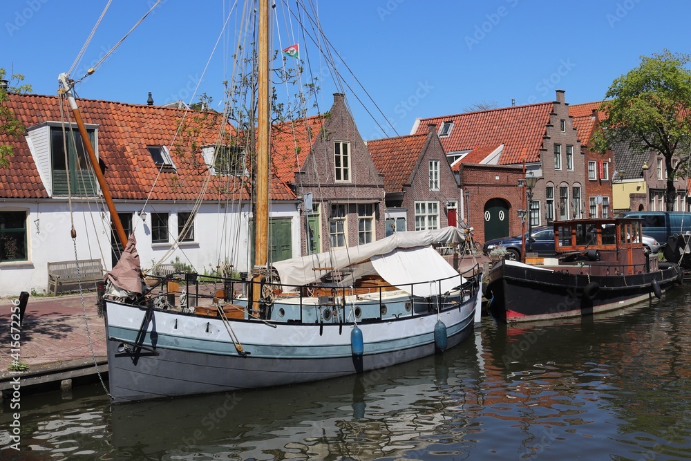 Canal with Historic Houses and Boats in Edam, The Netherlands