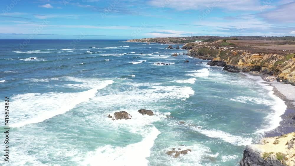 Scenic Foamy Crashing Waves Moving Towards Coastal Cliffs At Costa Vicentina In Alentejo, Portugal. - Aerial Drone Shot Scenic Foamy Crashing Waves Moving Towards Coastal Cliffs At Costa Vicentina In Alentejo, Portugal. - Aerial Drone Shot