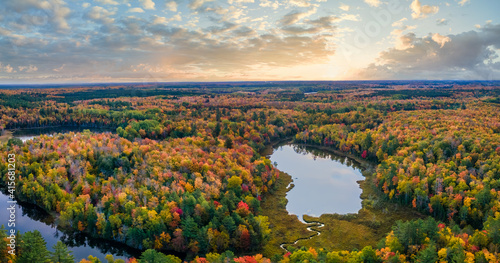 Beautiful autumn sunset over Snipe Lake in the Hiawatha National Forest     Michigan Upper Peninsula     aerial view 