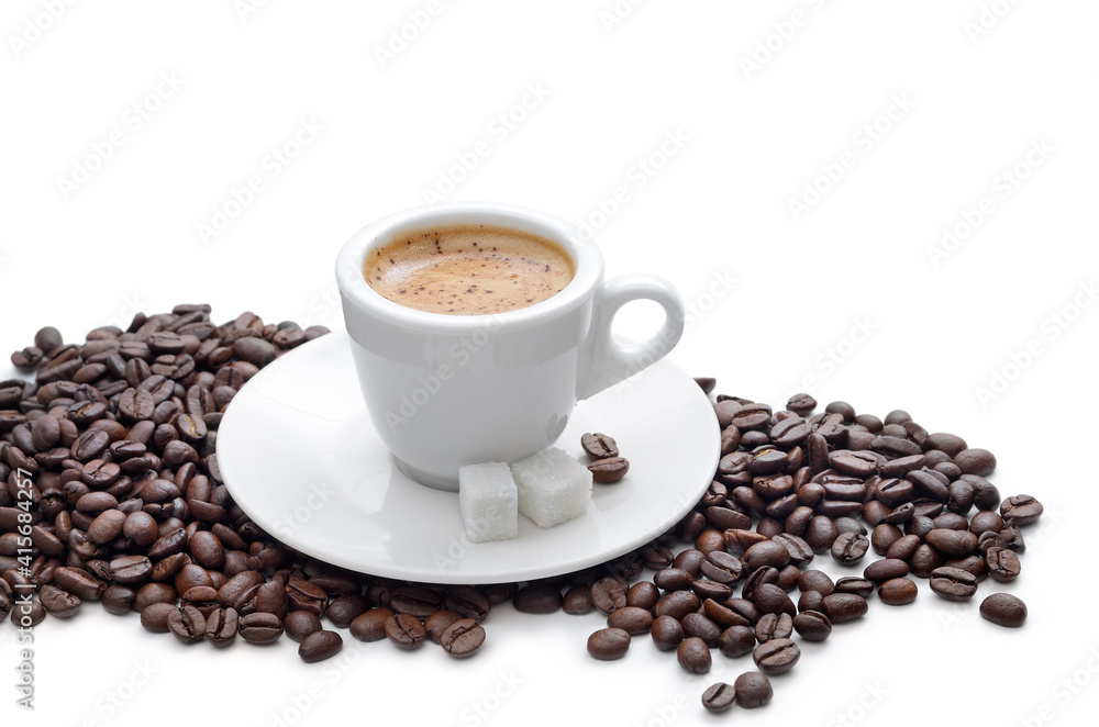 Fototapeta premium Aromatic coffee in a cup, coffee beans isolated on white.