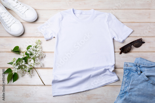 Women’s T-shirt mockup with lilac and white sneakers