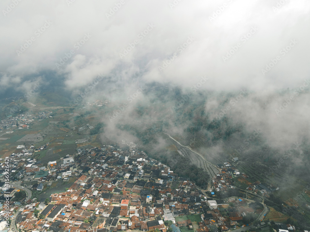 Aerial view of Dieng village at Wonosobo with mountain around it