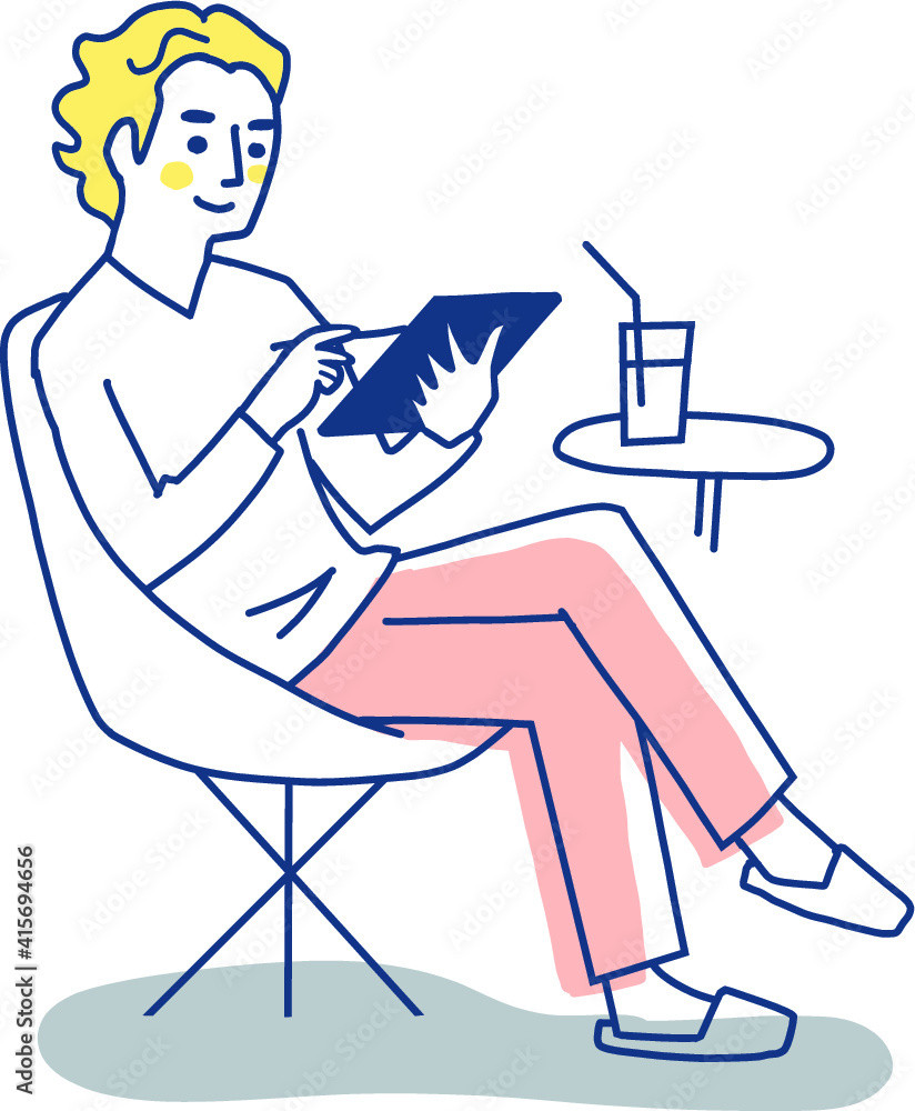 タブレット端末を操作する若い男性 タブレット端末を操作する若い男性