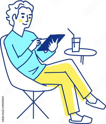 タブレット端末を操作する若い男性