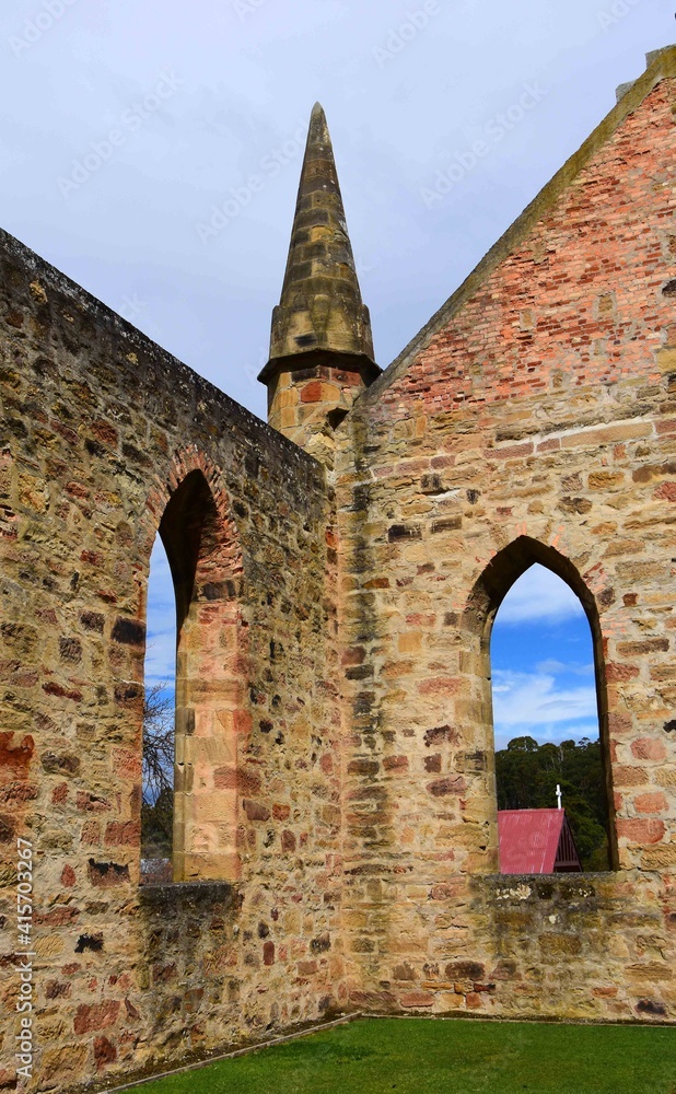 picturesque ruins in summer of the gothic-style convict church at the port arthur historic site, port arthur, tasmania, australia