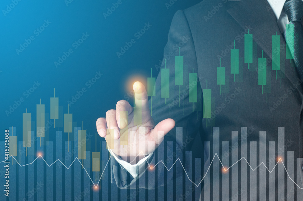 success concept. businessman finger touch candlestick chart with bar graph on virtual screen show financial profit and revenue growth of personal investment success concept. businessman finger touch candlestick chart with bar graph on virtual screen show financial profit and revenue growth of personal investment