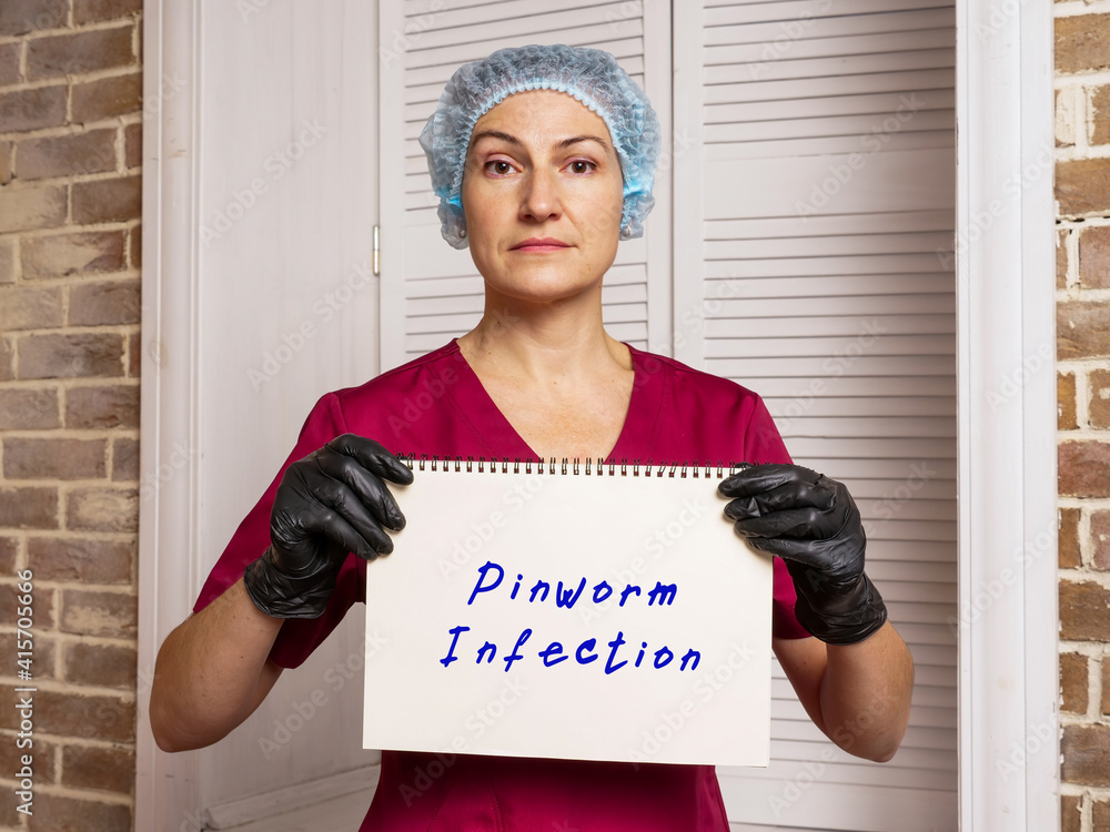 Pinworm Infection sign on the sheet. Stock Photo Adobe Stock