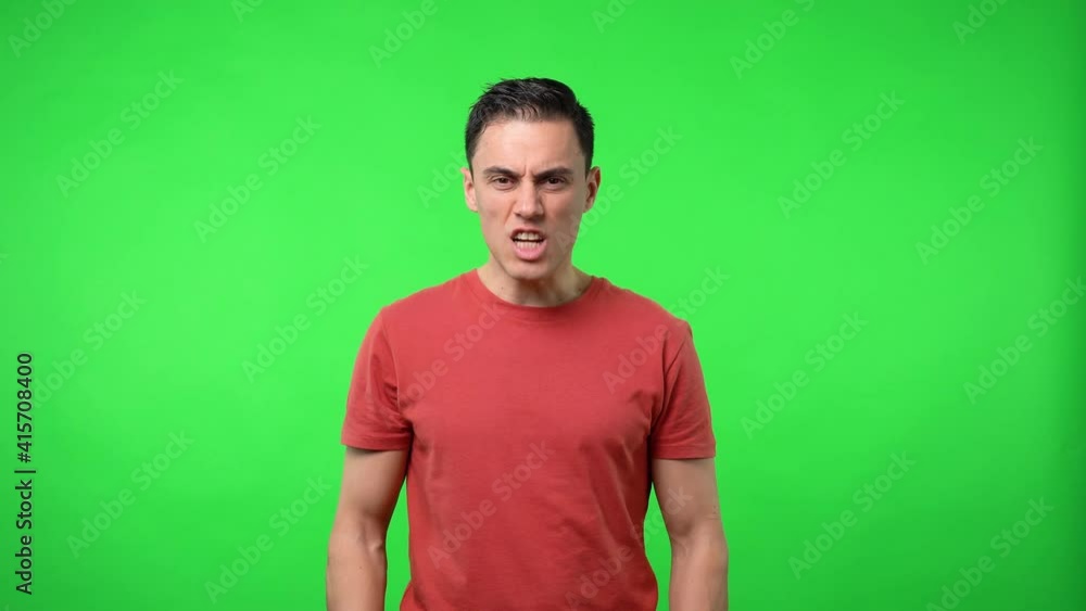 Seductive man trying to conquer someone. Chroma green background. Seductive man trying to conquer someone. Chroma green background.