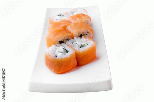 Japanese food restaurant delivery, sushi set . Sushi unagi, tempura rolls california with salmon, shrimp, tuna, caviar and cheese isolated at white background. 