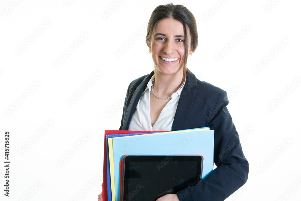 Happy young happy smiling business woman posing with document folders under his arm isolated in white wall background Happy young happy smiling business woman posing with document folders under his arm isolated in white wall background