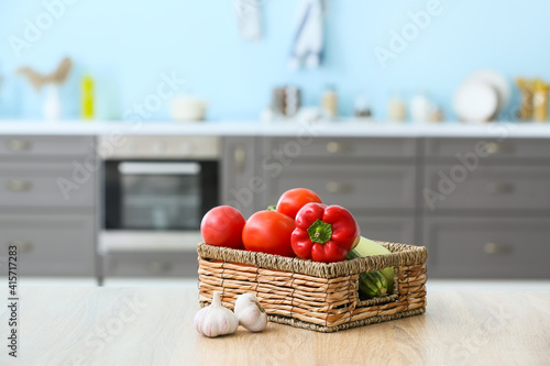 Box with vegetables on tabl...