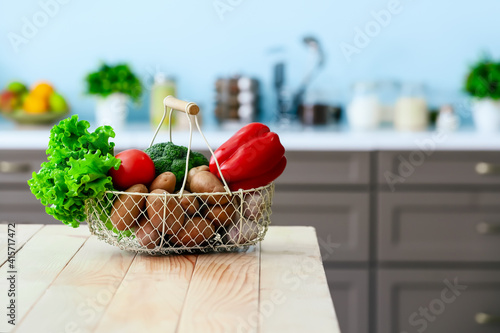 Basket with vegetables on t...