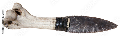 Φωτογραφία Ancient stone dagger. Historical knife with bone handle