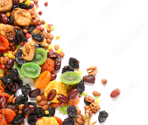Fototapeta Naklejka Na Ścianę i Meble -  Different dried fruits and nuts on white background