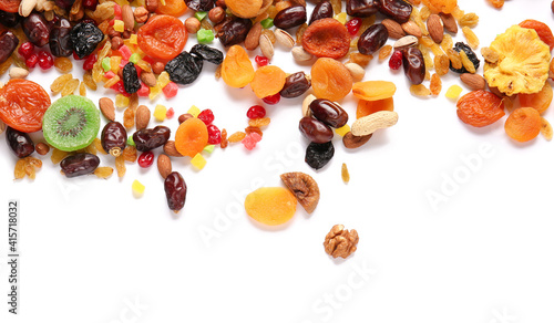 Fototapeta Naklejka Na Ścianę i Meble -  Different dried fruits and nuts on white background