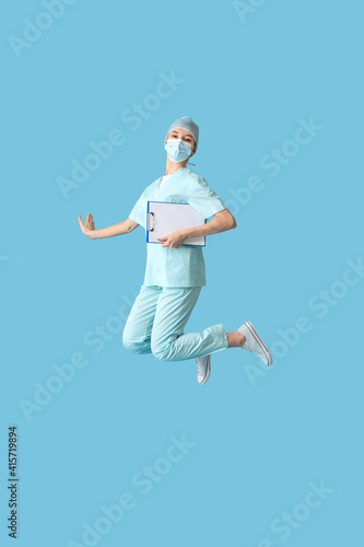 Jumping female doctor on co...