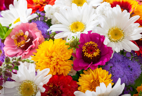 bouquet of summer flowers as background, top view