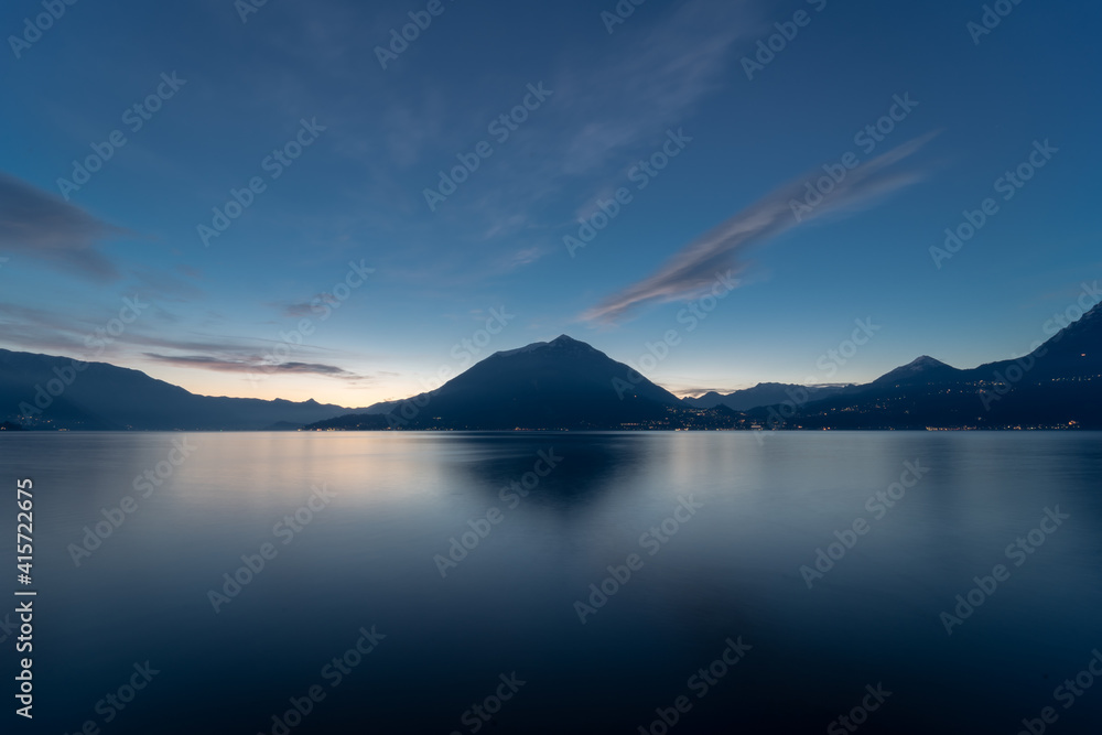 Panorama of Lake Como at blue hour with mountains
