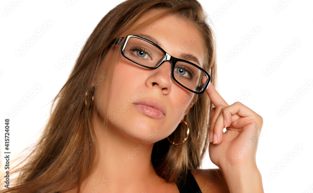 a young beautifu woman with blue eyes and glasses a young beautifu woman with blue eyes and glasses
