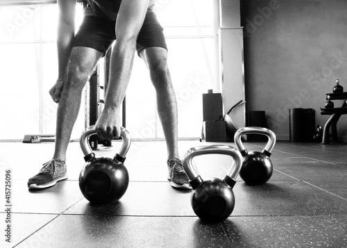 Foto Young  man working out in gym.