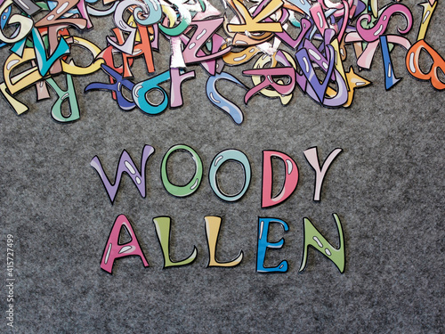 Woody Allen Hand-drawn keyword colorful puzzle with grey furry background projection view