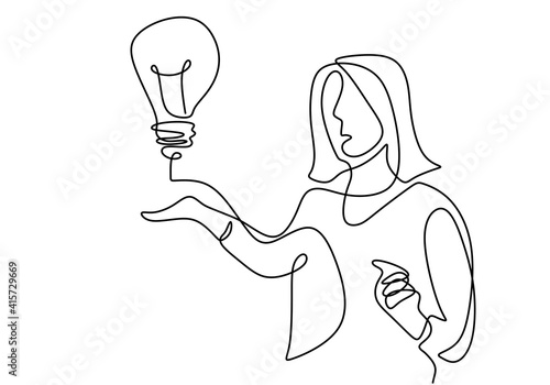One single line drawing of young businesswoman presenting new idea for next project while showing a bulb lamp. Think big, point to idea concept. Effective training presentation in minimalist style