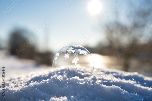 Ice crystals on a frozen soap bubble on a winter morning © Marcel
