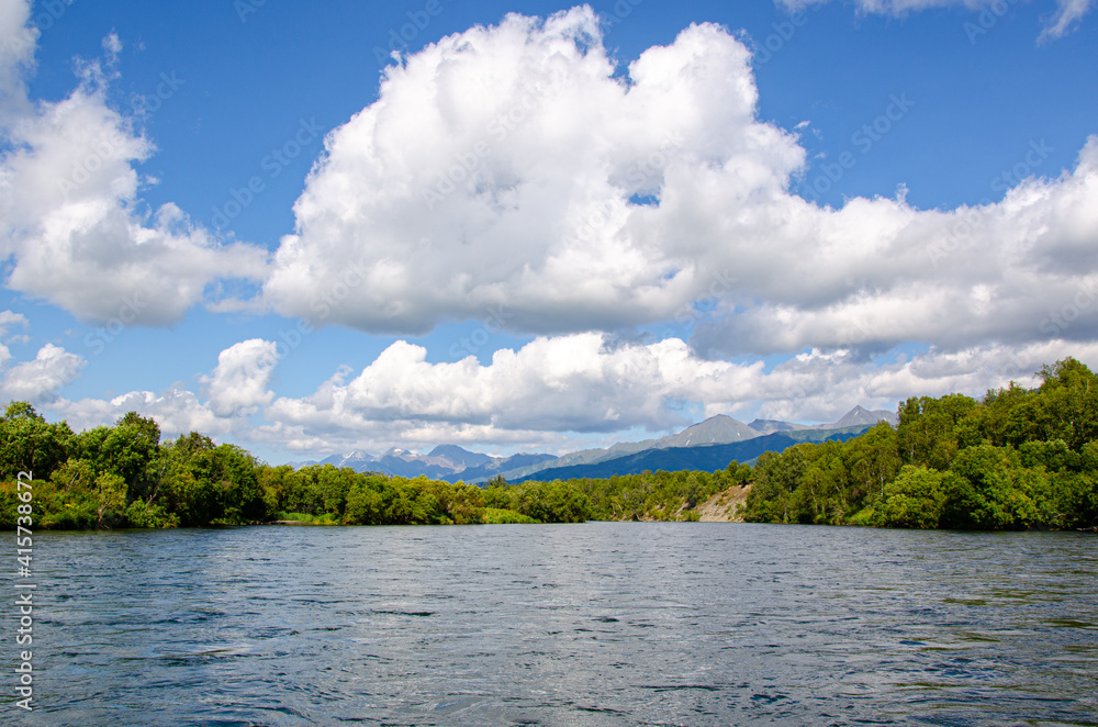 Clouds over the River. Russia, Kamchatka 2020. Photo taken during an expedition to the volcano. Clouds over the River. Russia, Kamchatka 2020. Photo taken during an expedition to the volcano.