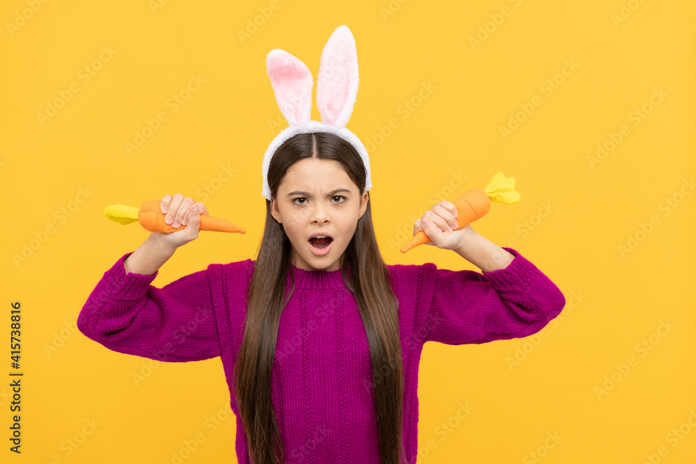 healthy carrot. child in rabbit costume. time for fun. adorable kid wearing funny hare ears.