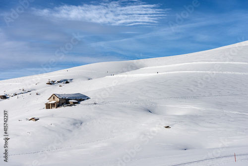 Altopiano della Lessinia (Lessinia Plateau), near Malga San Giorgio, ski resort in Verona province, Veneto, Italy, Europe. Old stone Farmhouse and cross-country ski tracks in winter with snow. © Alberto Masnovo