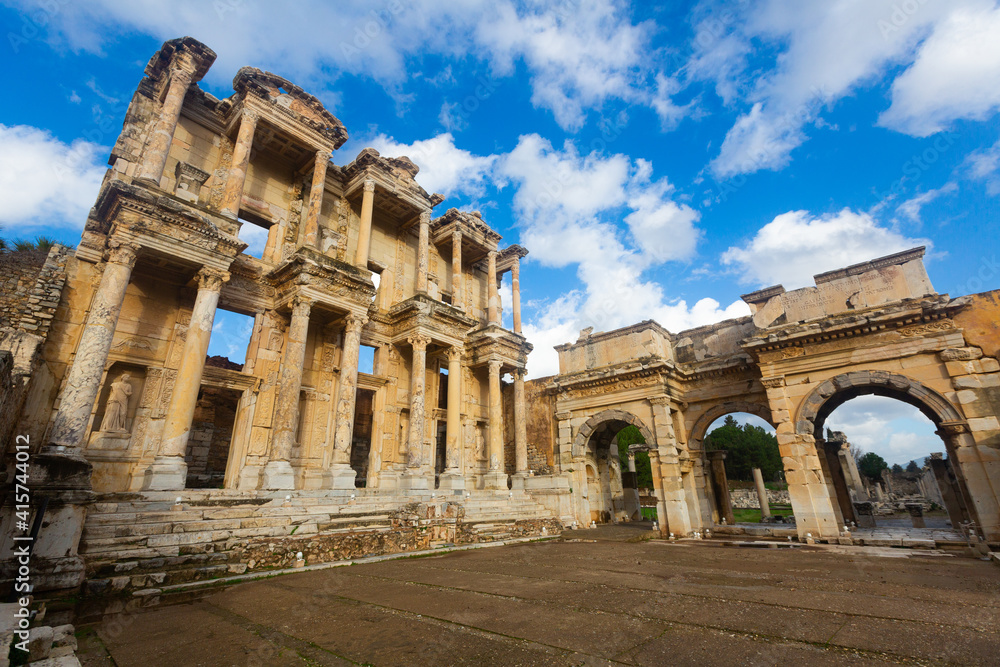 View of the decorative facade of the Library of Celsus and the Gate of Augustus in Ephesus...