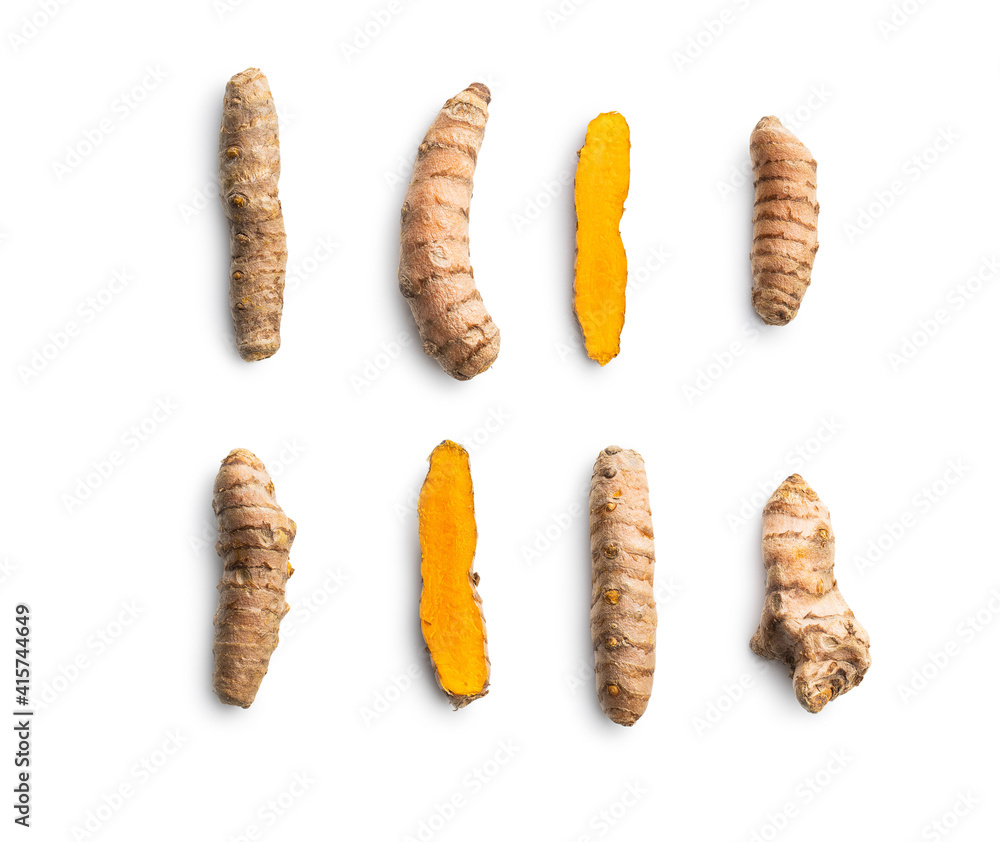 Indian turmeric root. Turmeric spice. Yellow turmeric on white background. Indian turmeric root. Turmeric spice. Yellow turmeric on white background.