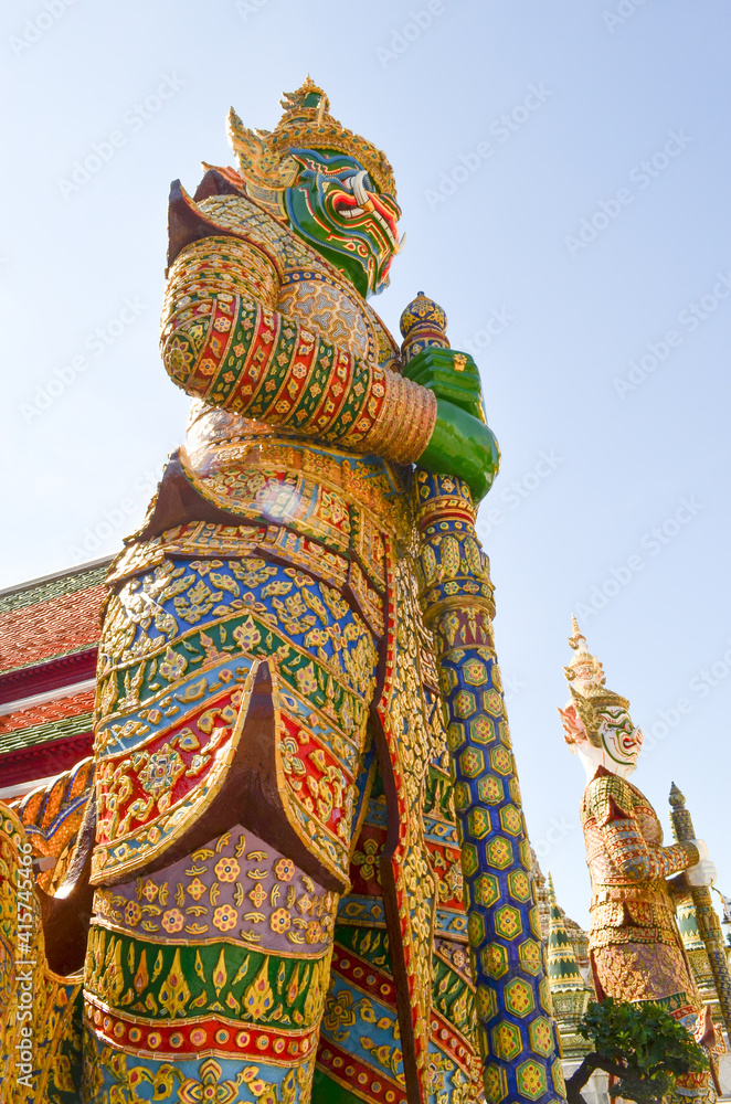 The giants in Bangkok grand palace landmark of Bangkok middle of the city, natural light. heritage zone temple section. The giants in Bangkok grand palace landmark of Bangkok middle of the city, natural light. heritage zone temple section.