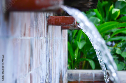 Wallpaper Mural Water flowing from the old pipe style agains the walls, wall decoration like a waterfall Torontodigital.ca