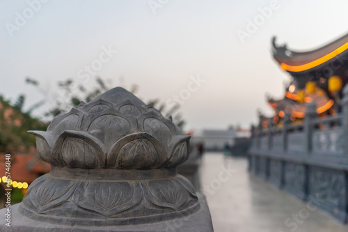 Beautiful traditional decorations and details on the roof of the temple at Vinh Nghiem monastery in Ho Chi Minh city, Vietnam