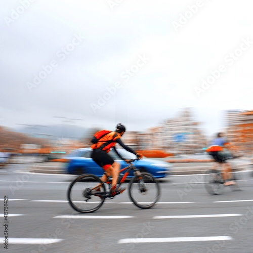 Fototapeta Naklejka Na Ścianę i Meble -  cyclist on the street in Bilbao city spain