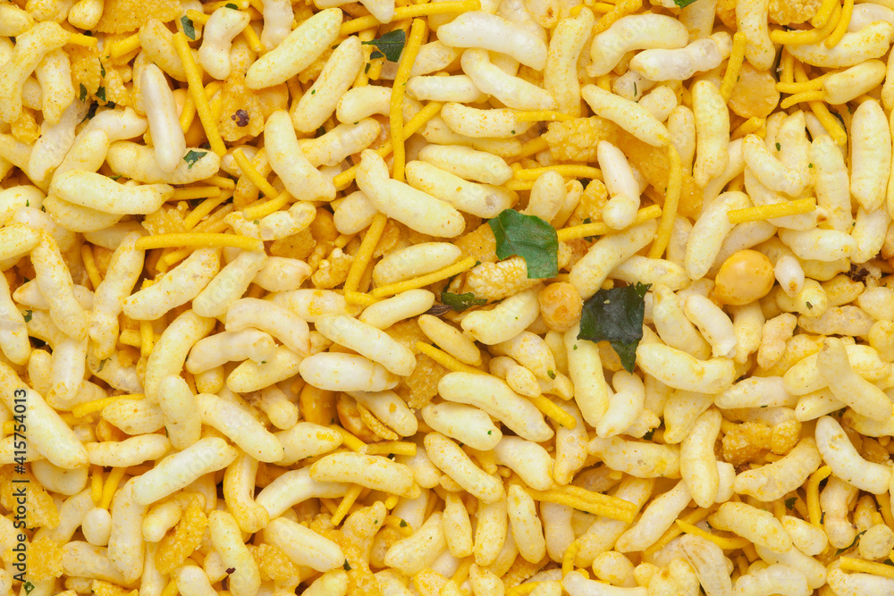 Crunchy Murmura full-frame wallpaper, made with Puffed Rice, Besan sev and Curry leaves. Indian salty snacks (Namkeen) Top view, Crunchy Murmura full-frame wallpaper, made with Puffed Rice, Besan sev and Curry leaves. Indian salty snacks (Namkeen) Top view,